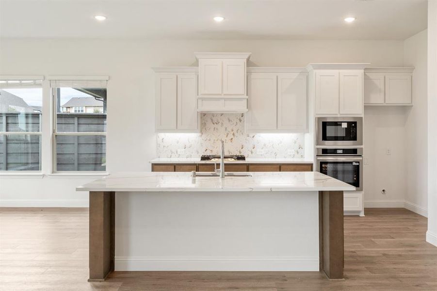 Furnished interior view inside a new home in Union Park Classic 60, Little Elm (Image 11). Furnished interior view inside a new home in Union Park Classic 60, Little Elm (Image 11).