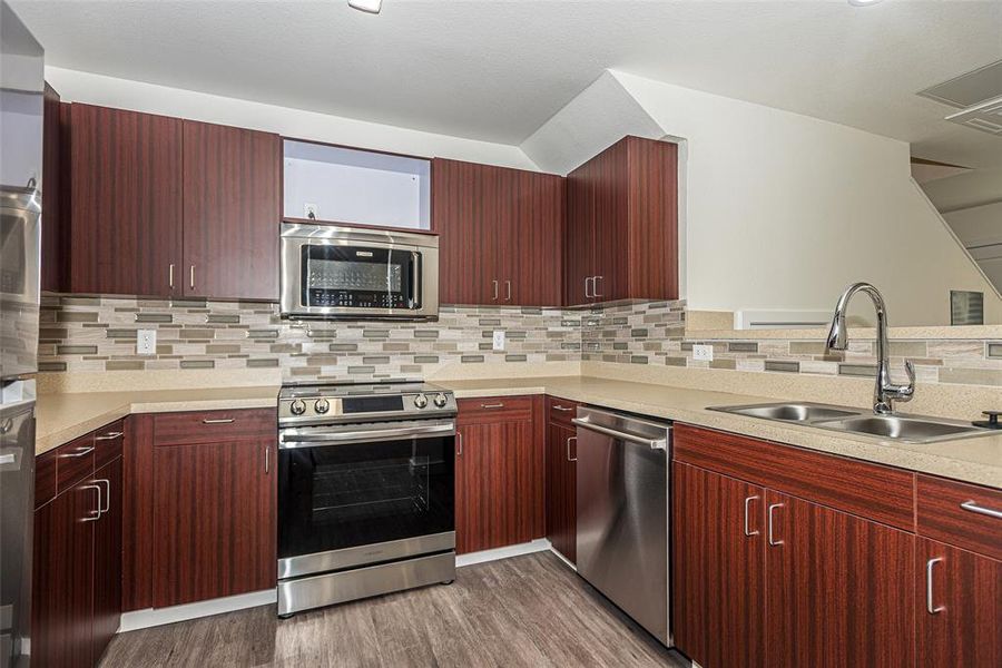 Kitchen has lots of cabinet space