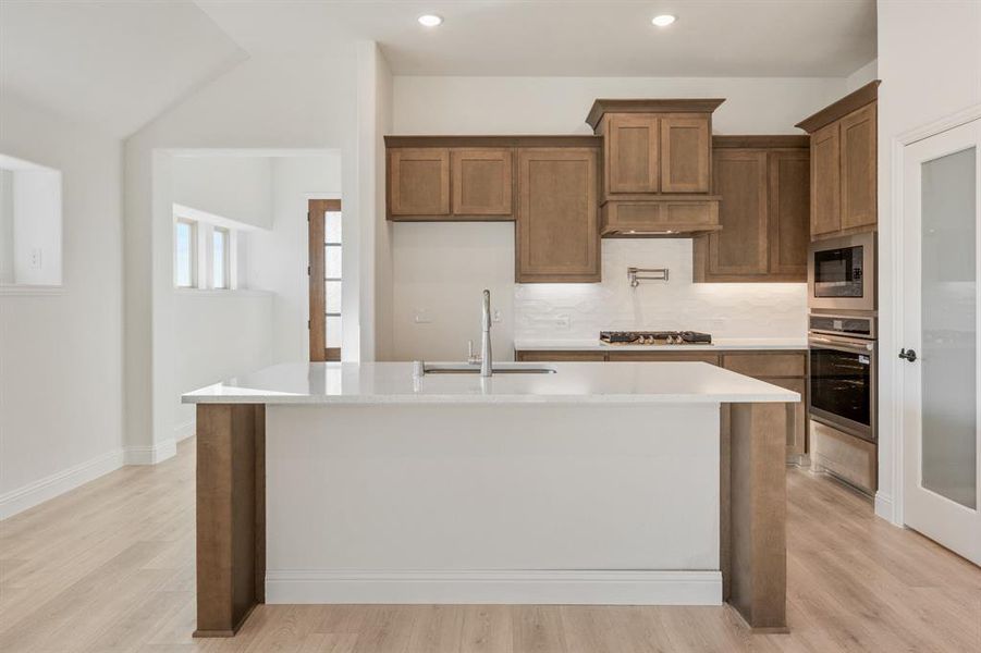 Furnished interior view inside a new home in Stone River Glen 50s, Royse City (Image 12).