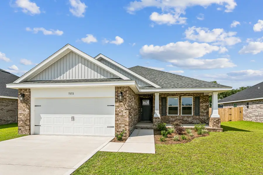 Representative exterior photo of a completed home built from the The Carlos by Herbst Homes in Buckeyes Landing, Navarre, FL (Image 32). Representative exterior photo of a completed home built from the The Carlos by Herbst Homes in Buckeyes Landing, Navarre, FL (Image 32).