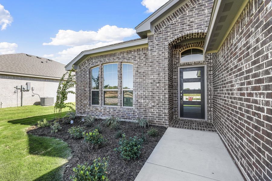 Representative exterior photo of a completed home built from the Hanover by Cheldan Homes in Craftsmen's Corner, Cleburne, TX (Image 23).