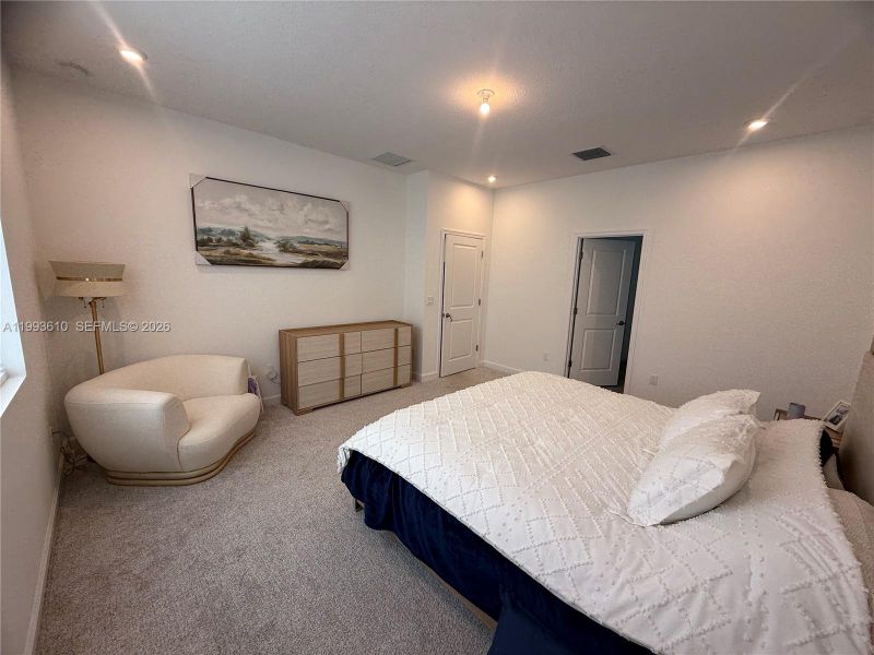 Furnished interior view inside a new home in Tradition, Port St. Lucie (Image 45).