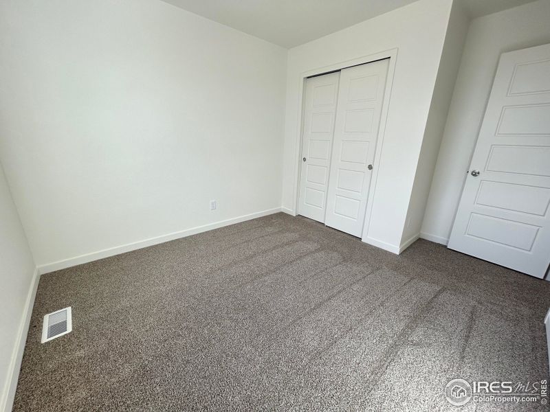 Spacious, unfurnished interior of a new home in Liberty Draw, Evans (Image 13).