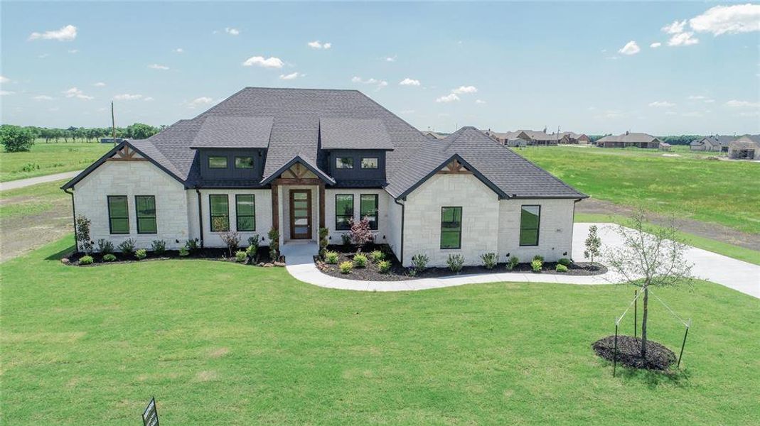 Front exterior of a new home in , Celeste, TX, highlighting curb appeal (Image 27).