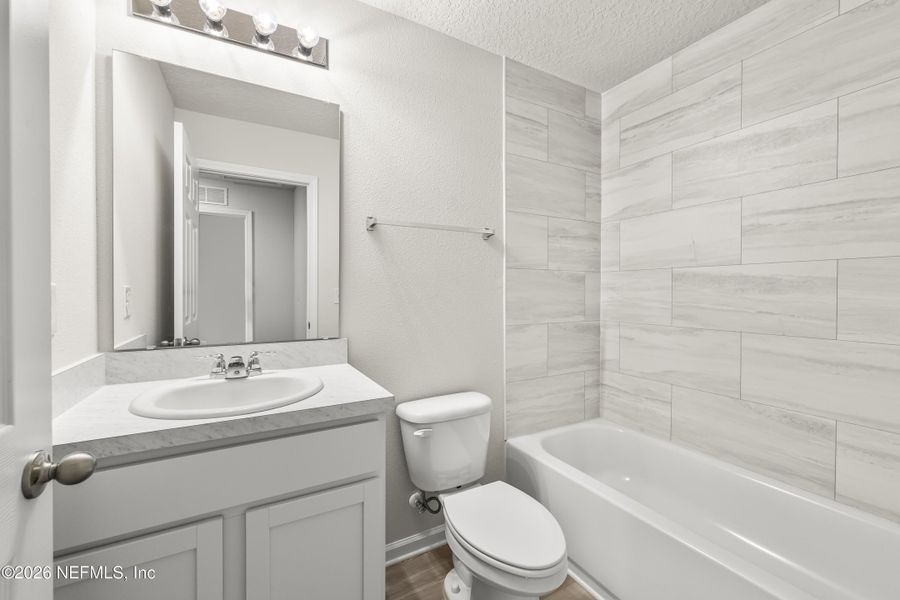 Furnished interior view inside a new home in , Jacksonville (Image 11). Furnished interior view inside a new home in , Jacksonville (Image 11).