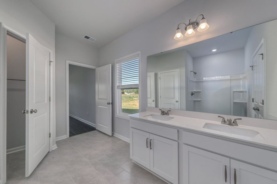 Furnished interior view inside a new home in Fairway Woods at Wyboo, Manning (Image 3). Furnished interior view inside a new home in Fairway Woods at Wyboo, Manning (Image 3).