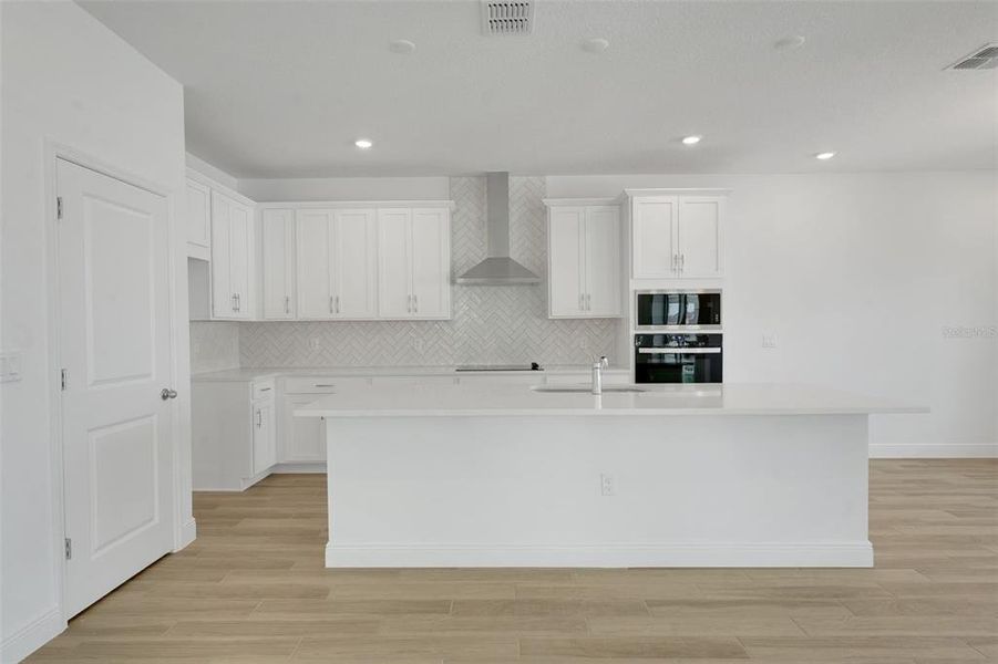 Furnished interior view inside a new home in Crossroads at Kelly Park, Apopka (Image 7).