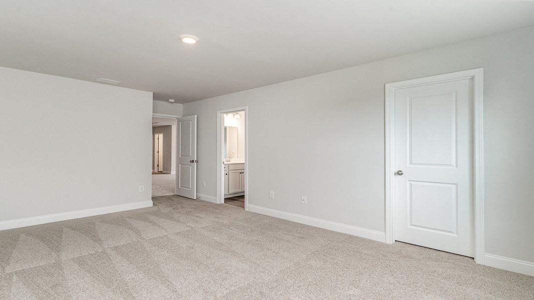 Representative unfurnished interior of a home built from the Westerly by D.R. Horton in Lake Tide Summit, Chapin (Image 30).