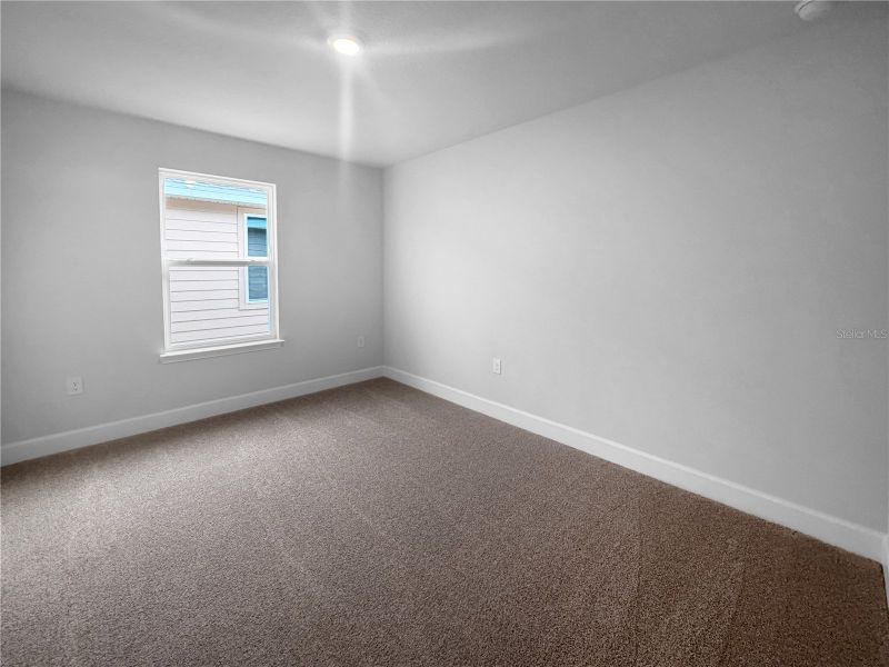 Spacious, unfurnished interior of a new home in Harmony Central, St. Cloud (Image 13).
