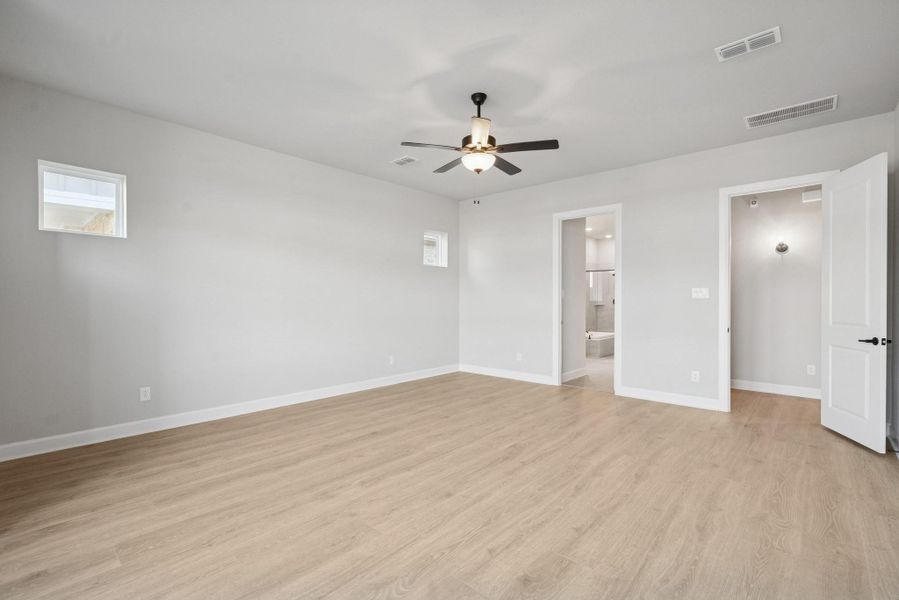 Spacious, unfurnished interior of a new home in Riceland 50’ Alley Load Homesites, Mont Belvieu (Image 20).