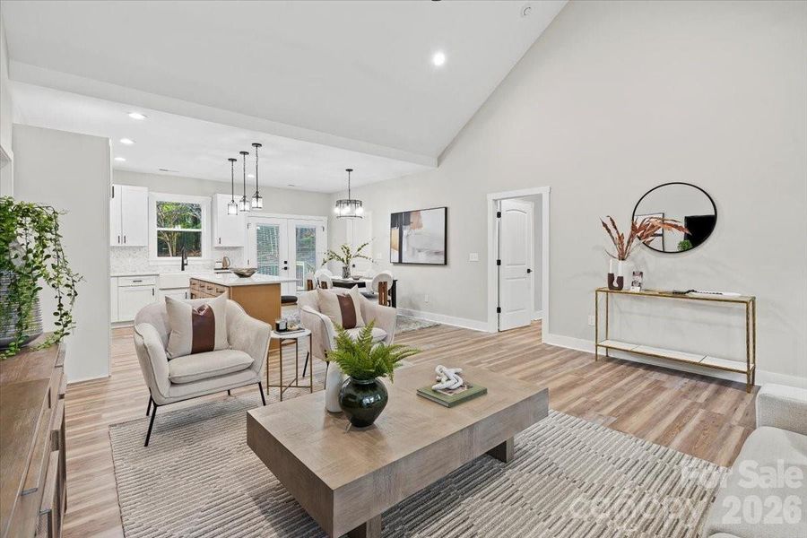 Photo of nearly identical home so you can see the space with furniture.