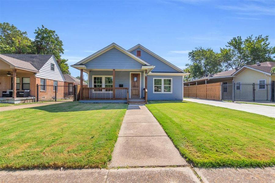 Bungalow-style home with a porch