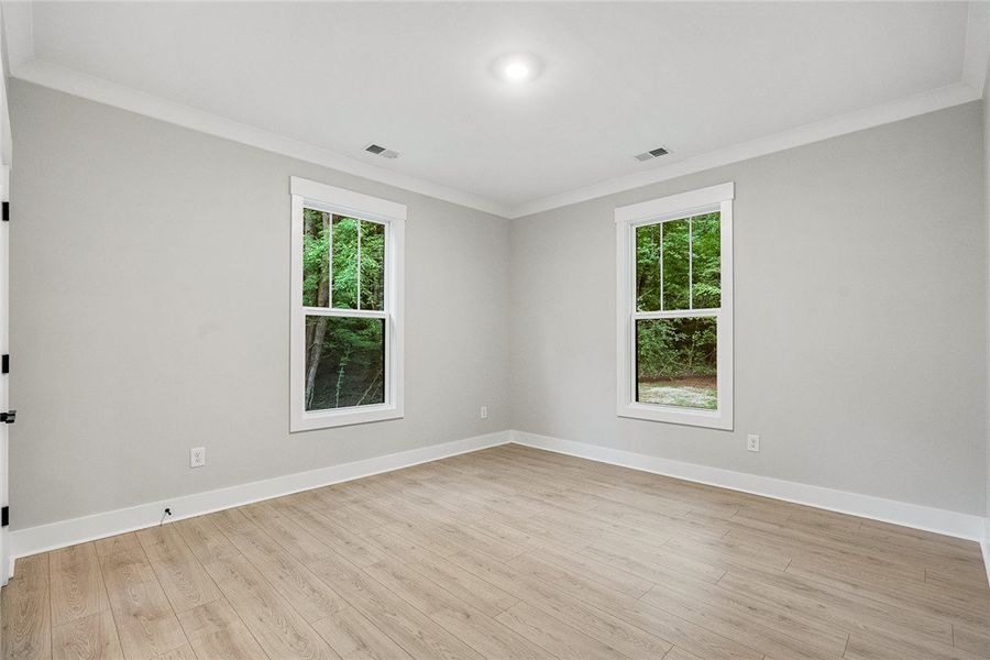 Hardwood floors and dual windows invite abundant n Hardwood floors and dual windows invite abundant n
