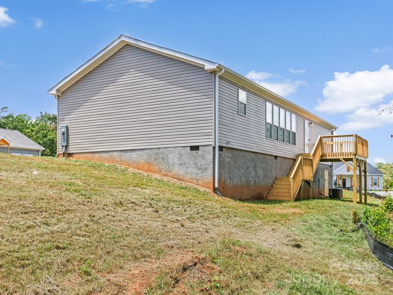 Front exterior of a new home in , Weaverville, NC, highlighting curb appeal (Image 1). Front exterior of a new home in , Weaverville, NC, highlighting curb appeal (Image 1).