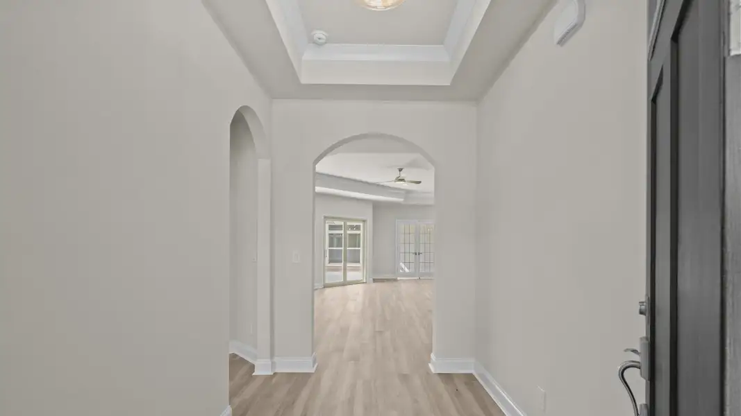 Spacious, unfurnished interior of a new home in Courtyards by Carrell, Ocean Isle Beach (Image 24). Spacious, unfurnished interior of a new home in Courtyards by Carrell, Ocean Isle Beach (Image 24).