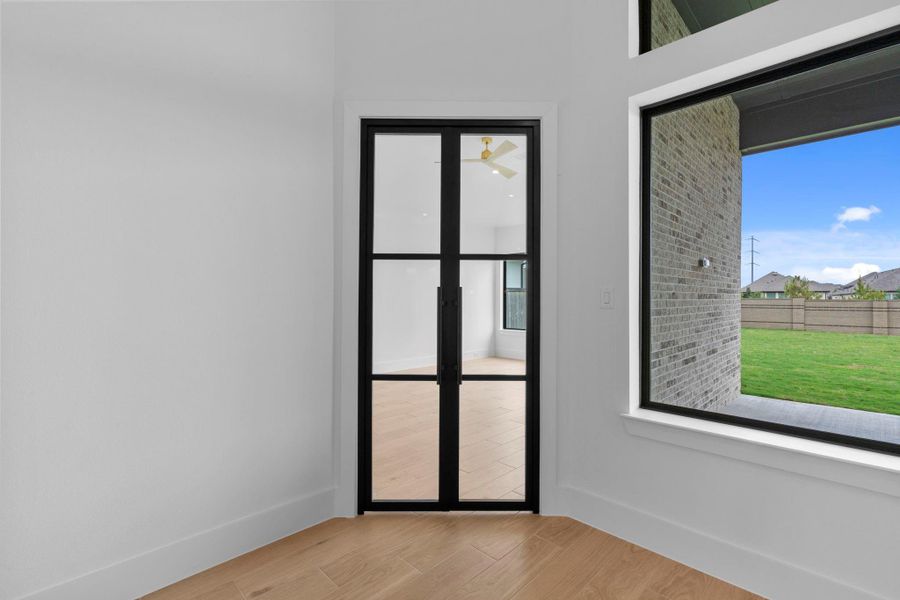 Back door leading out to your covered patio and outdoor kitchen. Representative image.