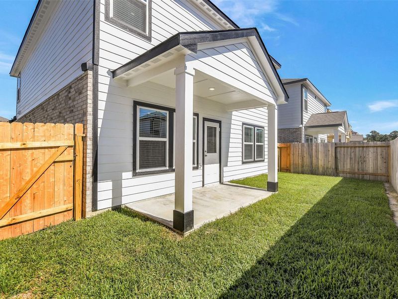 Exterior details and patio area of a home in Lakes at Black Oak, Magnolia (Image 18). Exterior details and patio area of a home in Lakes at Black Oak, Magnolia (Image 18).