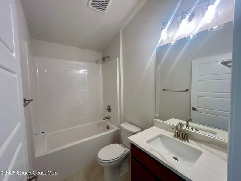 Furnished interior view inside a new home in St. John Preserve, Palm Bay (Image 7).