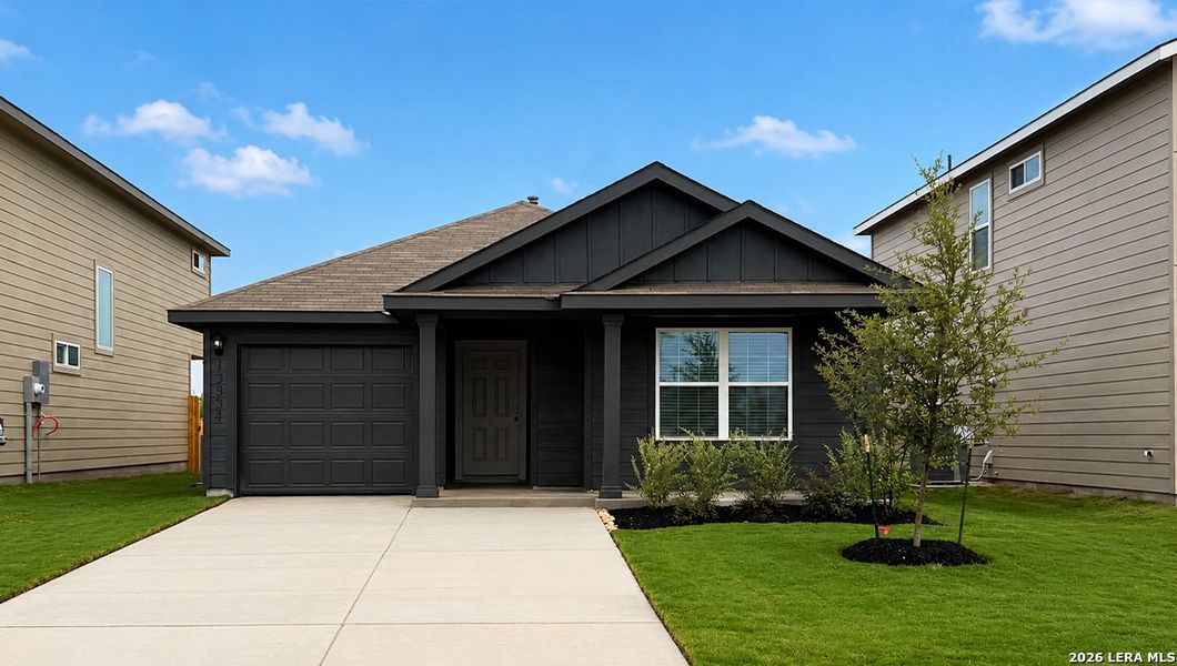 Front exterior of a new home in Riverstone at Westpointe, San Antonio, TX, highlighting curb appeal (Image 2).