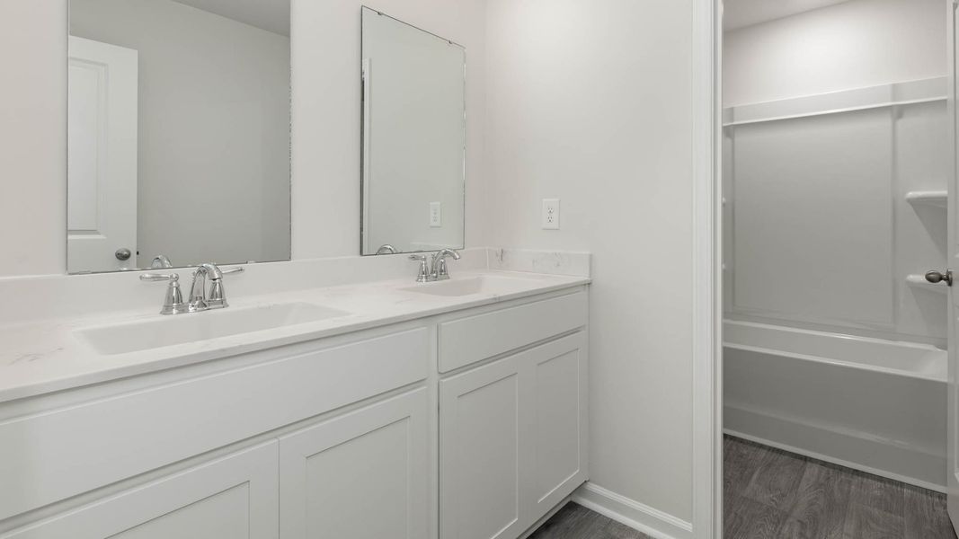 Representative furnished interior of a home built from the WREN by D.R. Horton in Cedar Hill Landing, Navassa (Image 10).