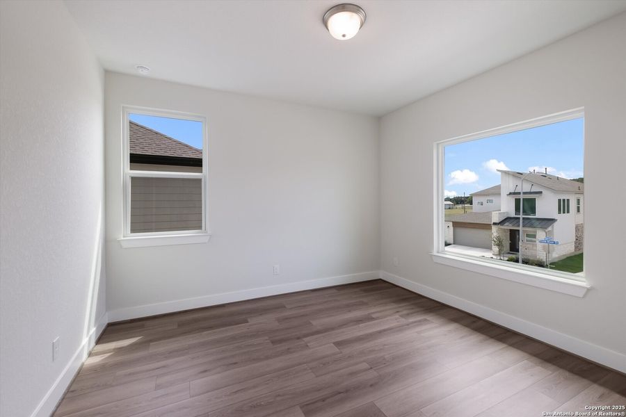 Spacious, unfurnished interior of a new home in Crown Ridge Manor, San Antonio (Image 26).