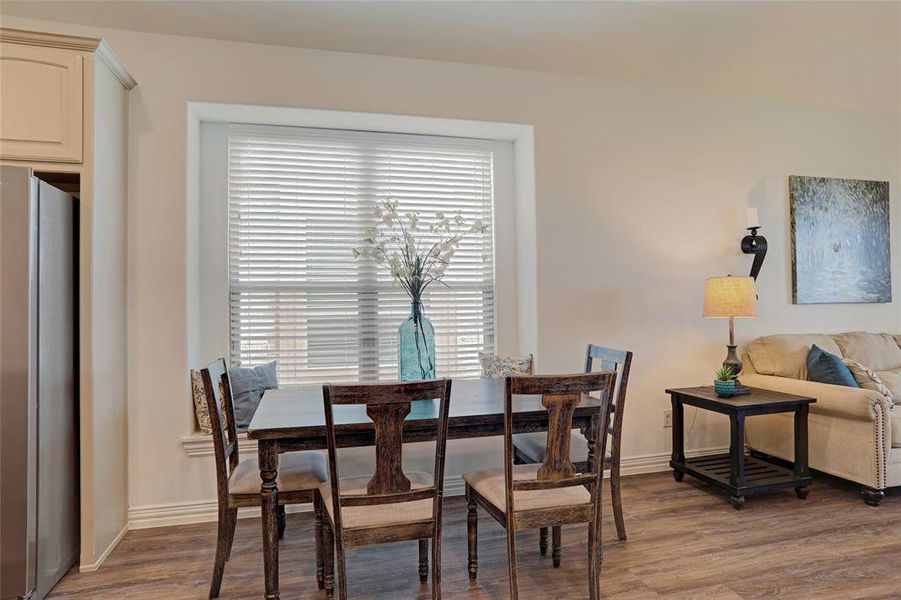 Dining space featuring hardwood / wood-style floors