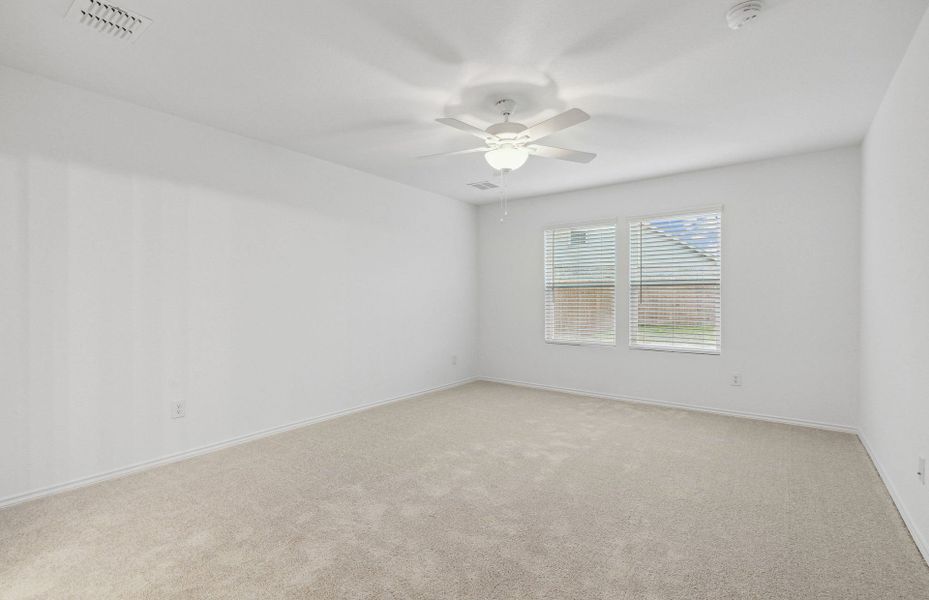 Spacious owner's suite with private bath