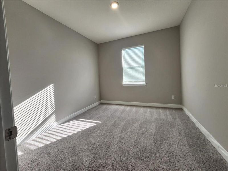 Spacious, unfurnished interior of a new home in Woodcreek, Wesley Chapel (Image 24).