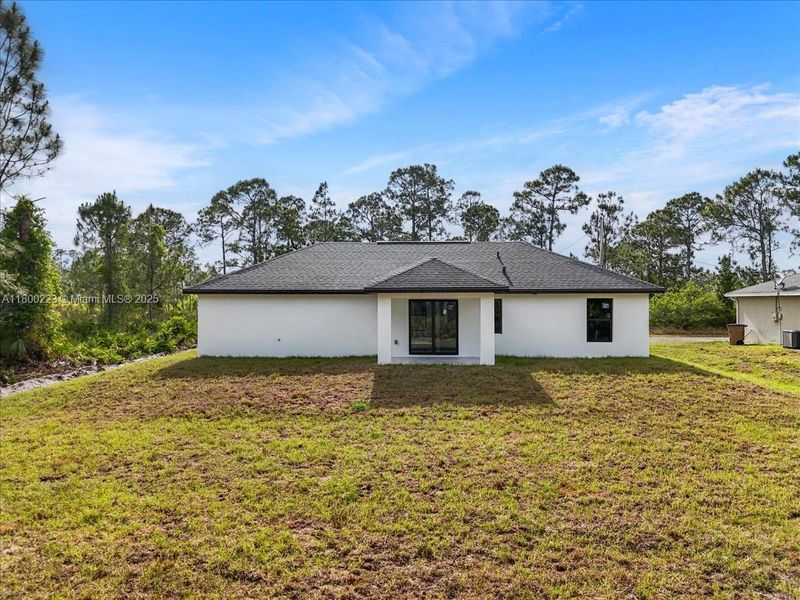 Exterior details and patio area of a home in , Lehigh Acres (Image 4). Exterior details and patio area of a home in , Lehigh Acres (Image 4).