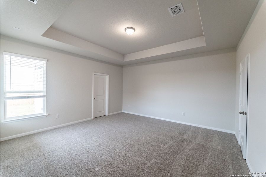 Spacious, unfurnished interior of a new home in The Woodlands at Medina Hills, Mico (Image 16).