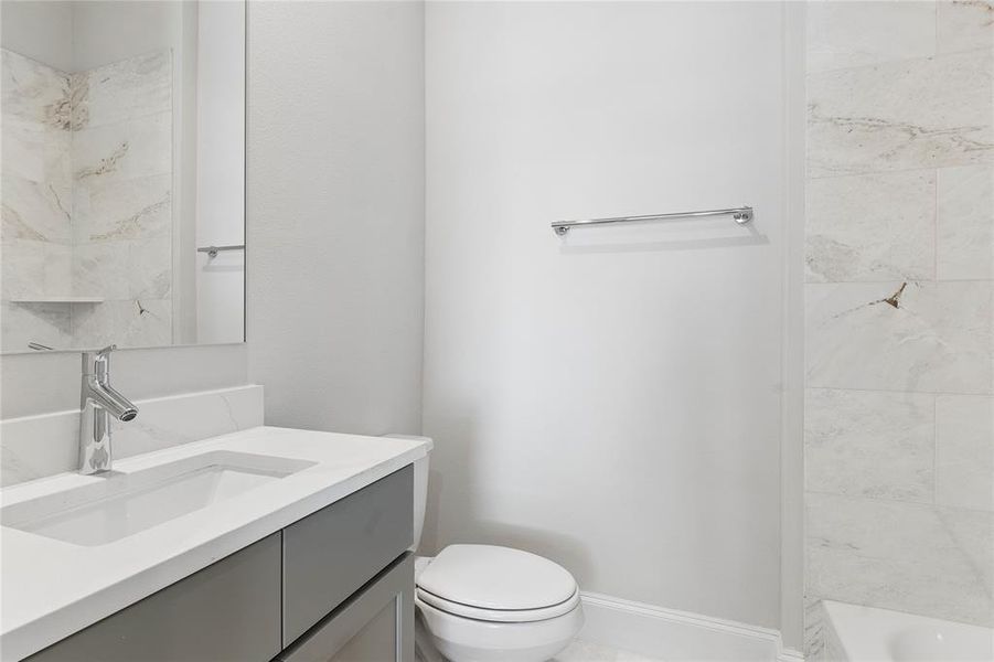 Image of model home with similar floorplan.