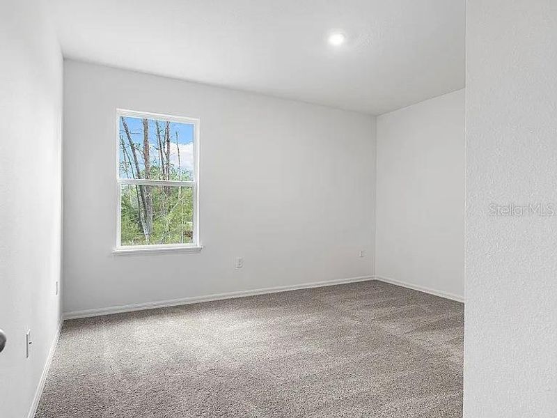 Spacious, unfurnished interior of a new home in Royal Highlands, Brooksville (Image 29).