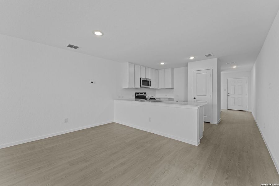 Spacious, unfurnished interior of a new home in Hidden Oasis, San Antonio (Image 12). Spacious, unfurnished interior of a new home in Hidden Oasis, San Antonio (Image 12).
