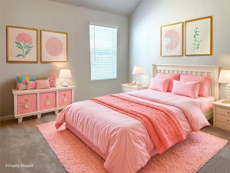 Bedroom 3 with carpet floors and lofted ceiling Bedroom 3 with carpet floors and lofted ceiling