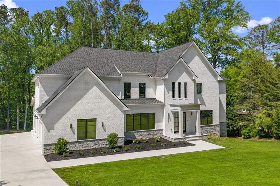 Front exterior of a new home in , Marietta, GA, highlighting curb appeal (Image 2). Front exterior of a new home in , Marietta, GA, highlighting curb appeal (Image 2).