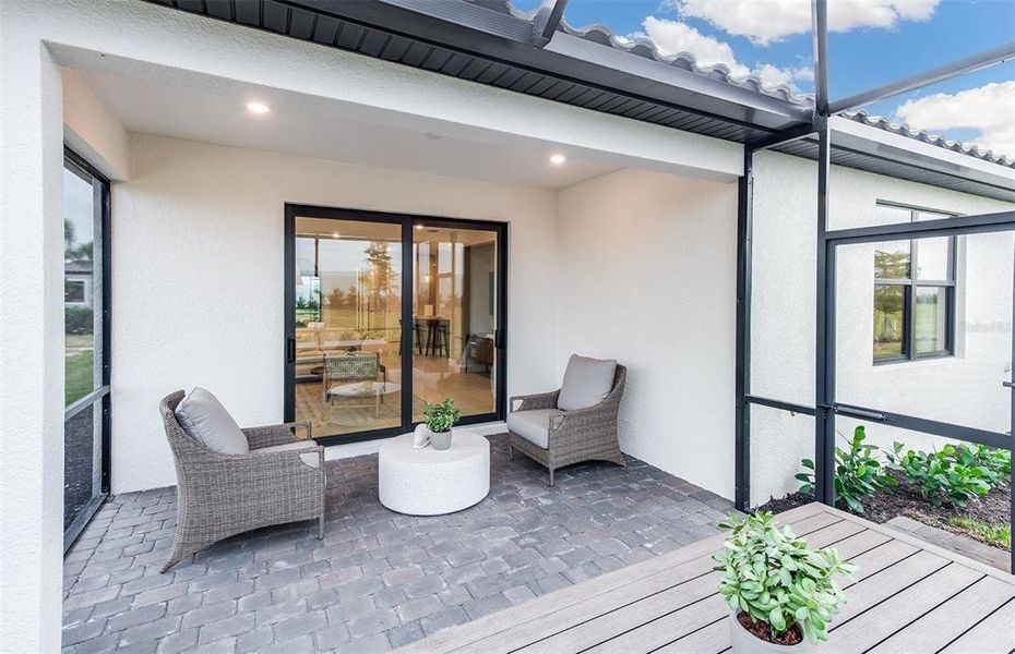 Exterior details and patio area of a home in Talon Preserve on Palmer Ranch, Nokomis (Image 22).