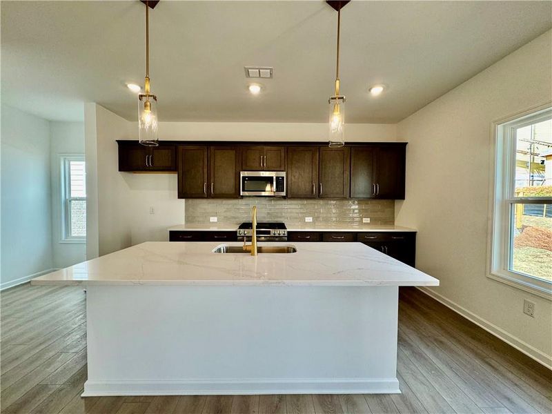 Furnished interior view inside a new home in Eastlyn Crossing, Flowery Branch (Image 9).