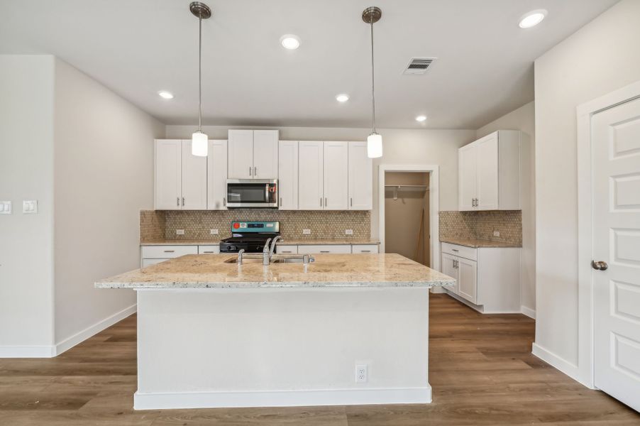 Furnished interior view inside a new home in Granger Pointe - Traditional Series, Conroe (Image 4).