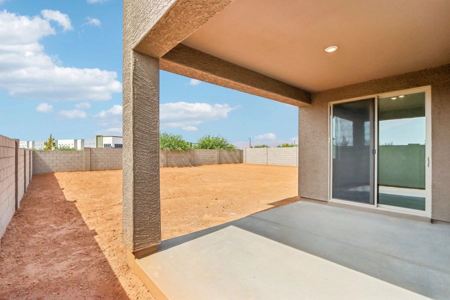 Covered patio to large backyard Covered patio to large backyard
