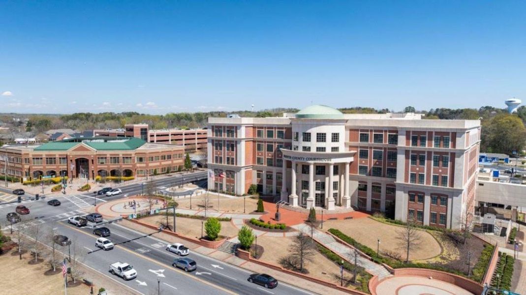 Front exterior of a new home in Haven Abbey, Cumming, GA, highlighting curb appeal (Image 1).