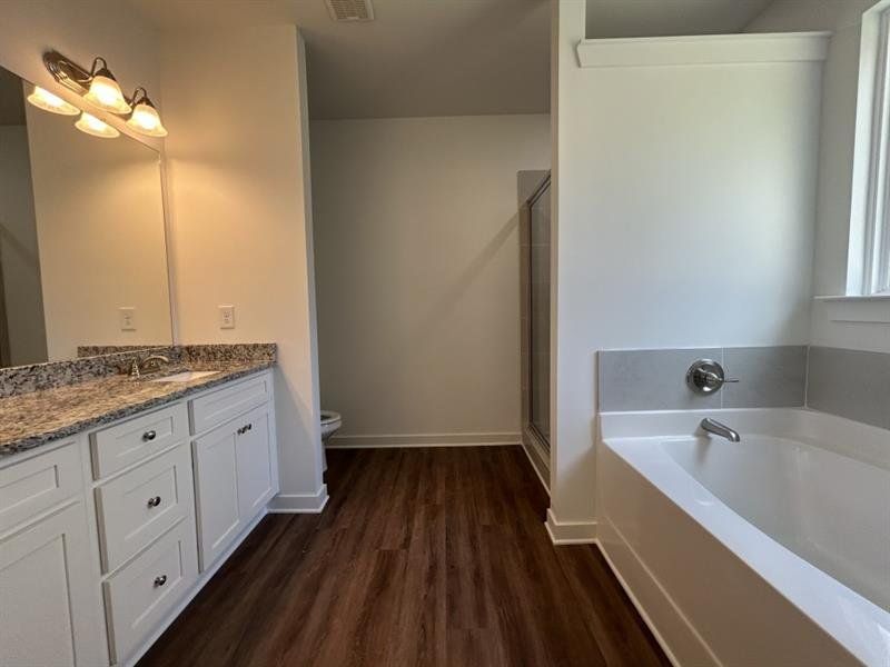Furnished interior view inside a new home in Sutton's Landing, Statham (Image 4).