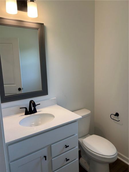 A pristine bathroom features a vanity with sleek b A pristine bathroom features a vanity with sleek b