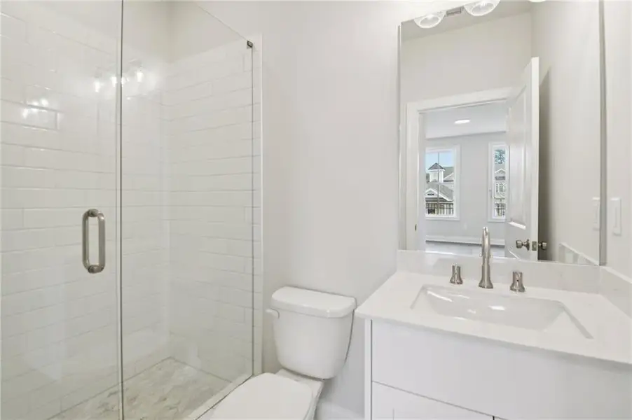 Furnished interior view inside a new home in Ward's Crossing Townhomes, Johns Creek (Image 4).