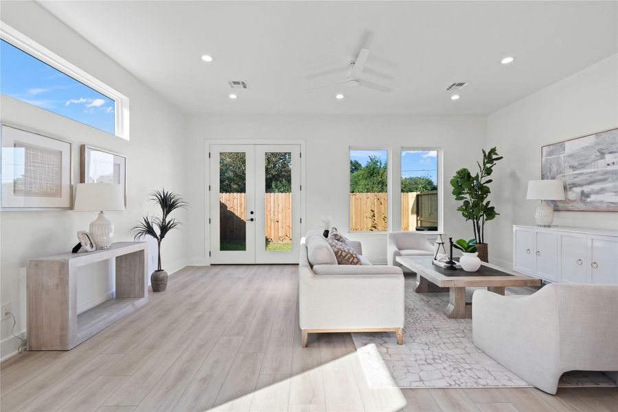 This open-concept layout effortlessly defines each living area while maintaining a seamless flow throughout the home. Every space—kitchen, dining, and living—is thoughtfully arranged so nothing obstructs the natural movement, making daily life and entertaining a breeze. It’s a perfect balance of openness and function, inviting both connection and comfort. This open-concept layout effortlessly defines each living area while maintaining a seamless flow throughout the home. Every space—kitchen, dining, and living—is thoughtfully arranged so nothing obstructs the natural movement, making daily life and entertaining a breeze. It’s a perfect balance of openness and function, inviting both connection and comfort.