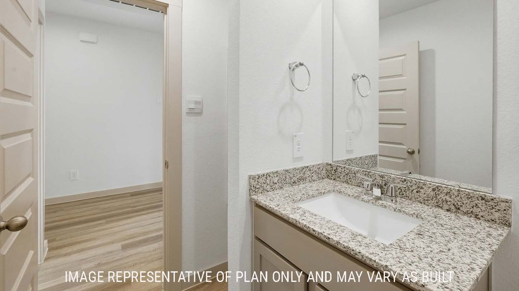 Furnished interior view inside a new home in Reserve at Mallard Lakes, Orange (Image 13).