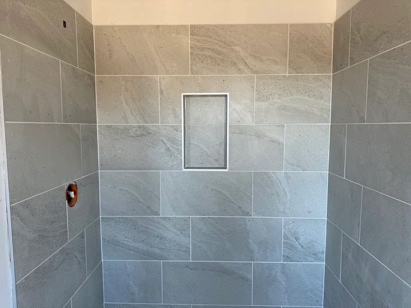 Primary Bath featuring the AW Collection® Serene - Clean forms offer quiet luxury.