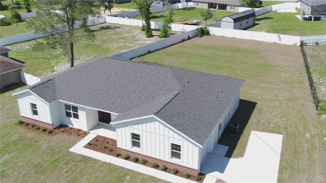 Front exterior of a new home in , Ocala, FL, highlighting curb appeal (Image 25).