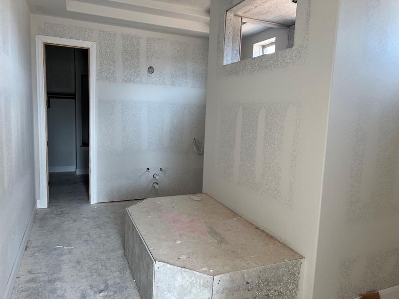 Spare room featuring concrete floors Spare room featuring concrete floors