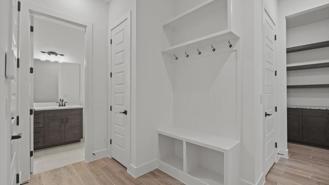 Furnished interior view inside a new home in 6 Creeks, Kyle (Image 7).