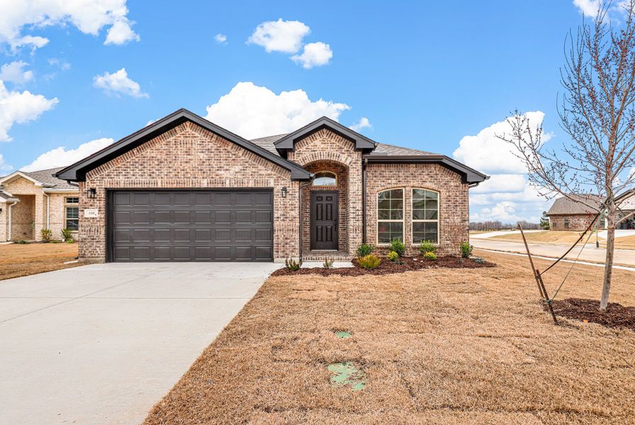 Representative exterior photo of a completed home built from the Devin by Cheldan Homes in Sunset Ridge, Keene, TX (Image 28). Representative exterior photo of a completed home built from the Devin by Cheldan Homes in Sunset Ridge, Keene, TX (Image 28).
